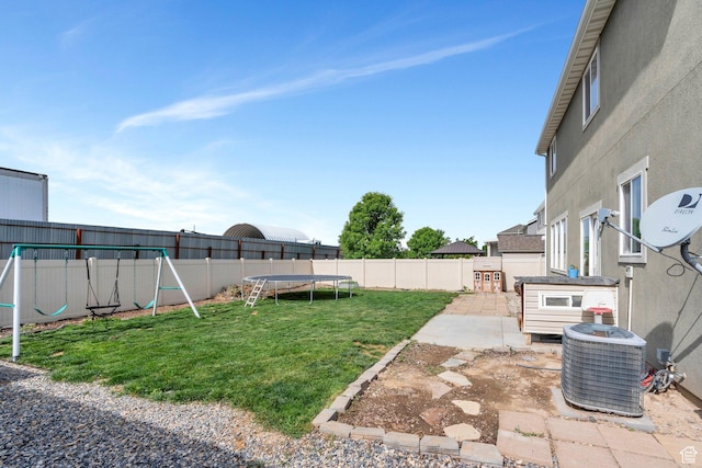 641 W 1450 S, Springville, UT 84663 - view of yard with a trampoline, a playground, central AC unit, and a patio area