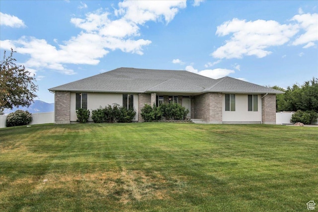 view of front of house featuring brick siding