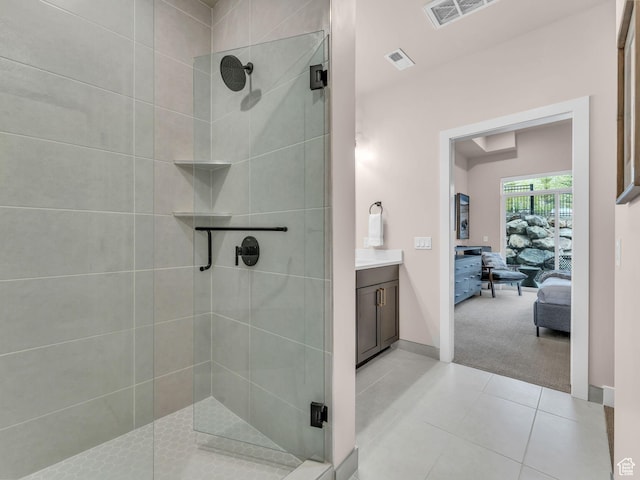 909 W Peace Tree Trl W Unit 416, Heber City, UT 84032 - ensuite bathroom with a stall shower, tile patterned floors, vanity, and baseboards