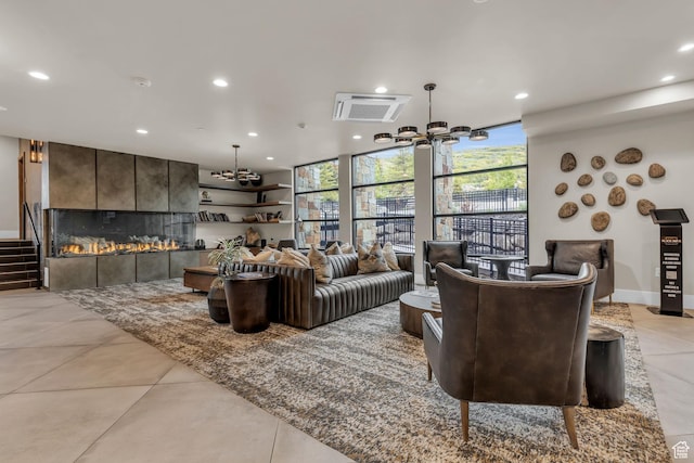 909 W Peace Tree Trl W Unit 416, Heber City, UT 84032 - living area featuring a chandelier, recessed lighting, a fireplace, light tile patterned floors, and expansive windows