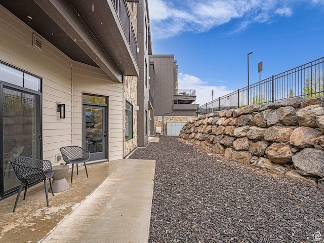 909 W Peace Tree Trl W Unit 416, Heber City, UT 84032 - view of yard featuring a patio and fence