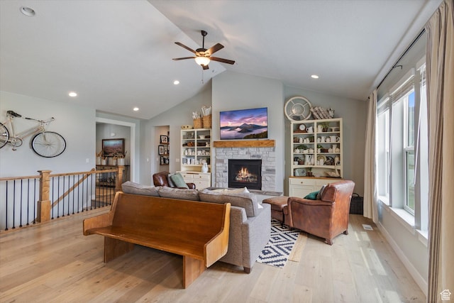 709 W 400 N, Mapleton, UT 84664 - living area with light wood-style flooring, lofted ceiling, a fireplace, ceiling fan, and recessed lighting