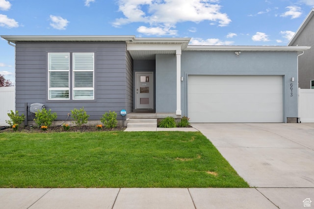 6613 S Ellerston Dr W, Murray, UT 84123 - view of front of property featuring a front lawn, a garage, and driveway