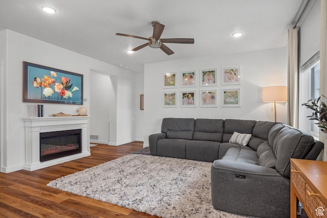 6613 S Ellerston Dr W, Murray, UT 84123 - living area with a ceiling fan, dark wood finished floors, a glass covered fireplace, baseboards, and recessed lighting