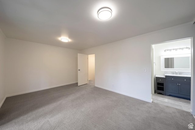 4604 S Woodduck Ln, Millcreek, UT 84117 - unfurnished bedroom with a sink, light carpet, baseboards, and ornamental molding