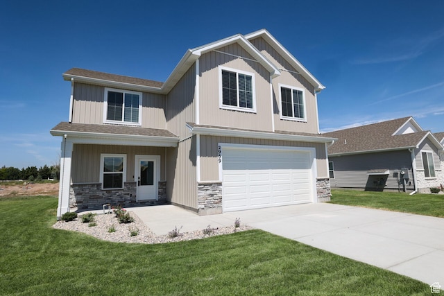 243 W 730 N, Smithfield, UT 84335 - craftsman house with stone siding, an attached garage, concrete driveway, and a front yard