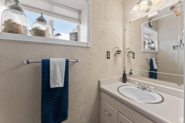 6407 N Dry Fork Cyn W, Dry Fork, UT 84078 - bathroom with a textured wall and vanity