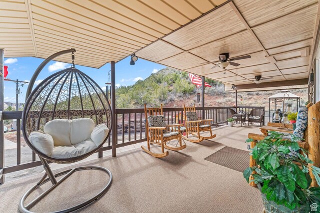 6407 N Dry Fork Cyn W, Dry Fork, UT 84078 - view of patio featuring a ceiling fan and outdoor dining space