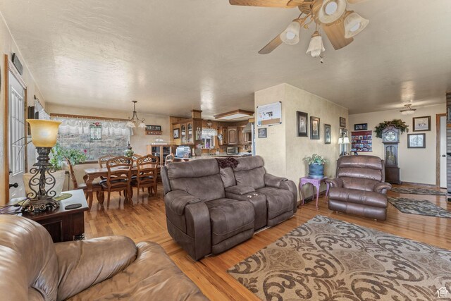 6407 N Dry Fork Cyn W, Dry Fork, UT 84078 - living room with ceiling fan and wood finished floors