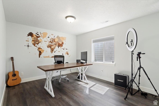 5118 N Blackbrush Dr, Eagle Mountain, UT 84005 - office featuring dark wood-style floors, baseboards, and a textured ceiling