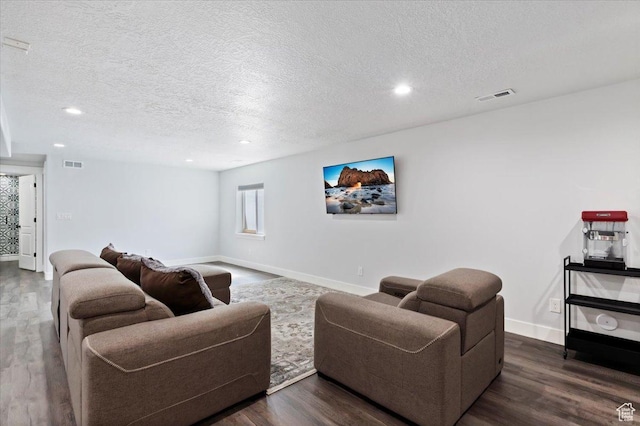 5118 N Blackbrush Dr, Eagle Mountain, UT 84005 - living room with a textured ceiling, wood finished floors, recessed lighting, and baseboards
