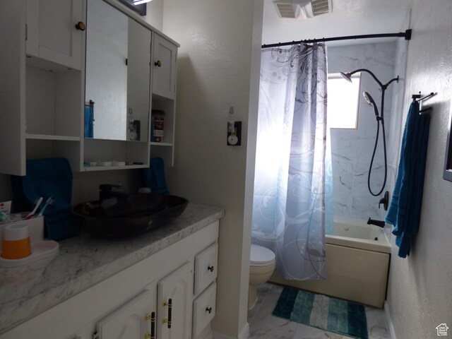 648 S 1350 E, Provo, UT 84606 - bathroom featuring marble look tile flooring, shower / bath combo with shower curtain, vanity, and toilet