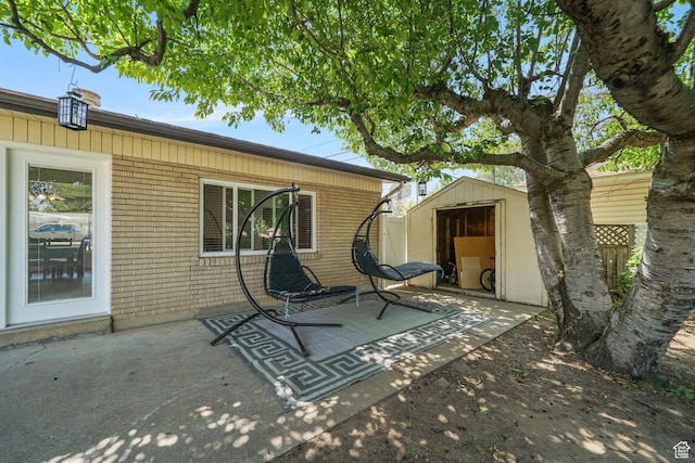 648 S 1350 E, Provo, UT 84606 - view of patio featuring a storage shed
