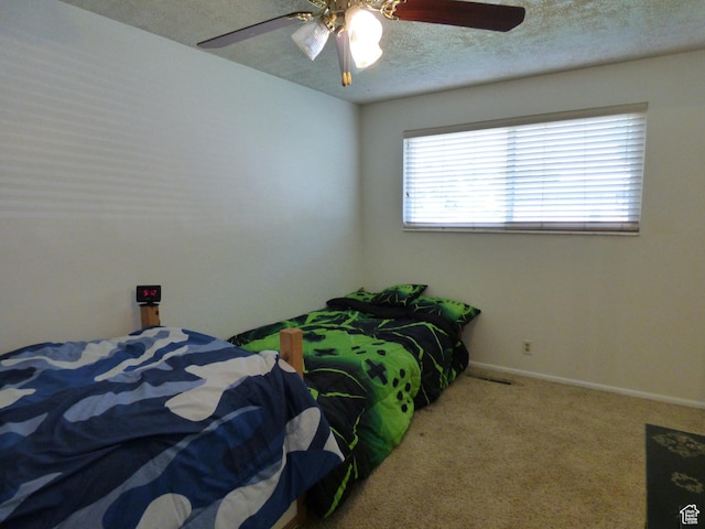 648 S 1350 E, Provo, UT 84606 - bedroom featuring a textured ceiling, carpet, a ceiling fan, and baseboards