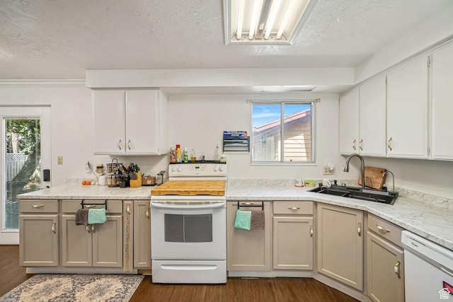 648 S 1350 E, Provo, UT 84606 - kitchen with white appliances, dark wood-style flooring, a textured ceiling, light countertops, and plenty of natural light