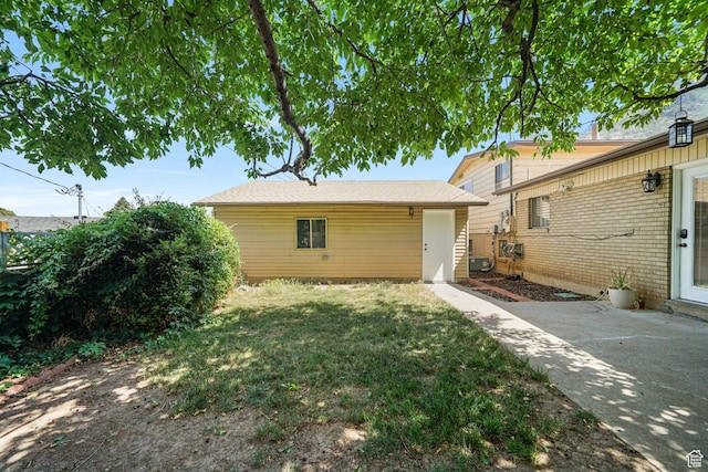 648 S 1350 E, Provo, UT 84606 - back of house with a lawn and a patio