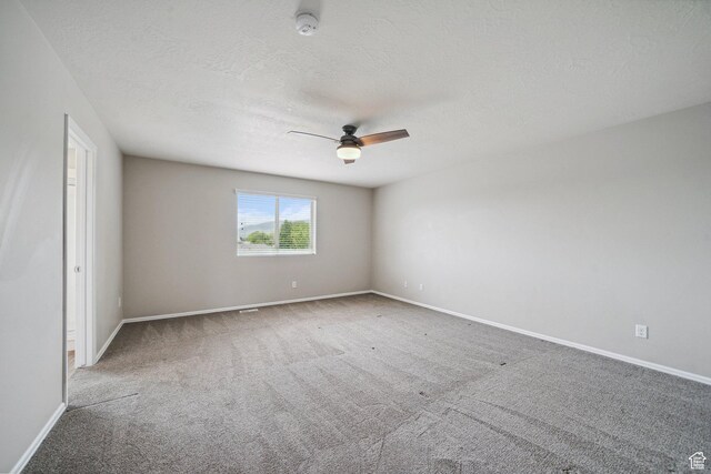 1805 W Grays Pl N, Lehi, UT 84043 - empty room featuring a ceiling fan, carpet floors, baseboards, a textured ceiling, and a smoke detector