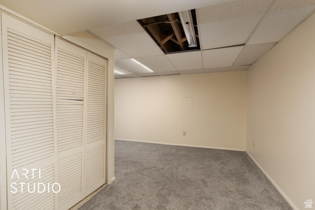941 E Carnation Dr, Sandy, UT 84094 - finished below grade area with a paneled ceiling, carpet, and baseboards