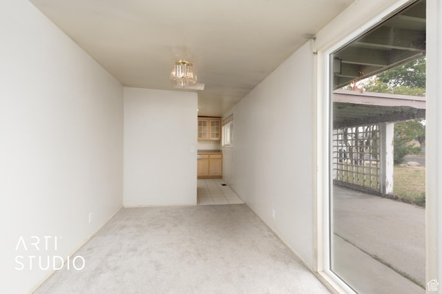 941 E Carnation Dr, Sandy, UT 84094 - corridor with a chandelier and carpet flooring
