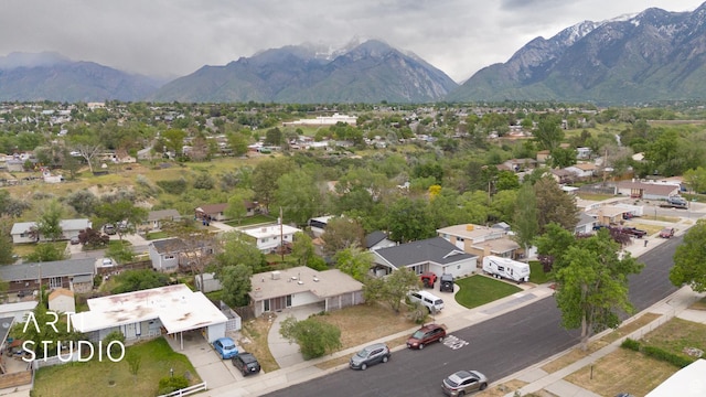 941 E Carnation Dr, Sandy, UT 84094 - aerial perspective of suburban area featuring a mountain backdrop