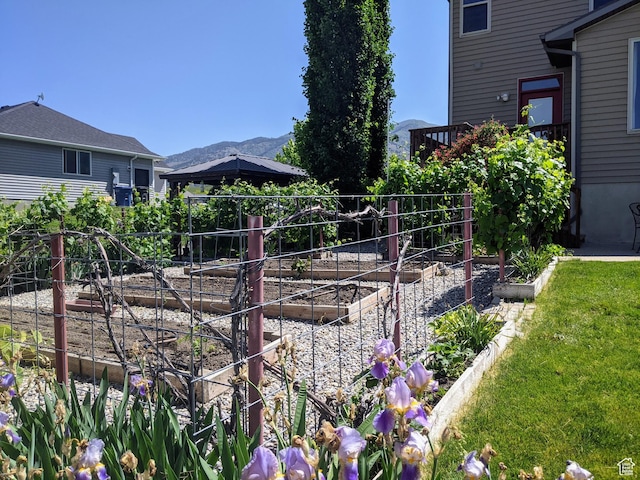 465 N 100th St E, Millville, UT 84326 - view of yard with a vegetable garden and a mountain view