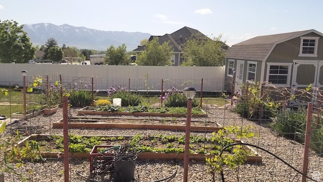 465 N 100th St E, Millville, UT 84326 - view of yard featuring a vegetable garden and a mountain view