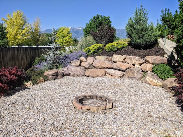 465 N 100th St E, Millville, UT 84326 - view of yard with a fire pit and a mountain view