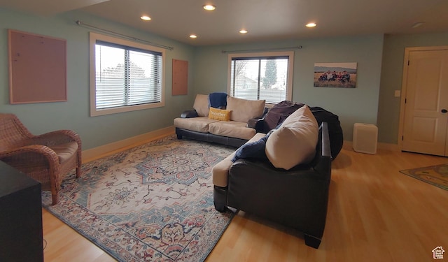465 N 100th St E, Millville, UT 84326 - living area featuring wood finished floors, healthy amount of natural light, baseboards, and recessed lighting