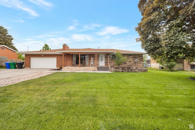 1885 W 300 N, West Point, UT 84015 - ranch-style house featuring a porch, brick siding, concrete driveway, a garage, and a front yard