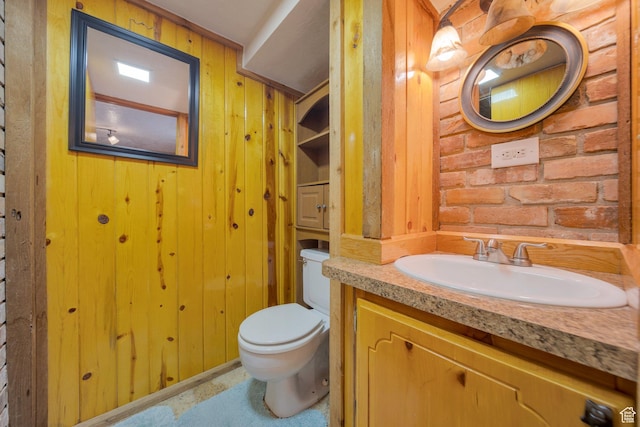 1885 W 300 N, West Point, UT 84015 - half bathroom featuring toilet, wooden walls, and vanity