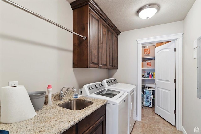 1776 W 3025 S, Syracuse, UT 84075 - laundry area with washing machine and dryer, cabinet space, and a textured ceiling