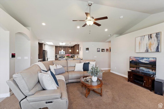 1776 W 3025 S, Syracuse, UT 84075 - living room featuring recessed lighting, a ceiling fan, baseboards, lofted ceiling, and light colored carpet