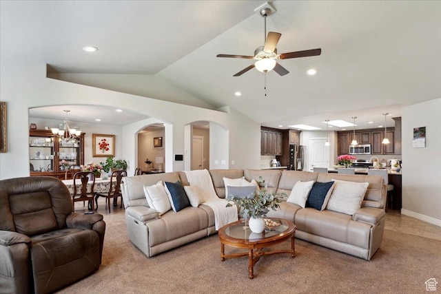 1776 W 3025 S, Syracuse, UT 84075 - living area featuring arched walkways, recessed lighting, vaulted ceiling, ceiling fan, and a chandelier