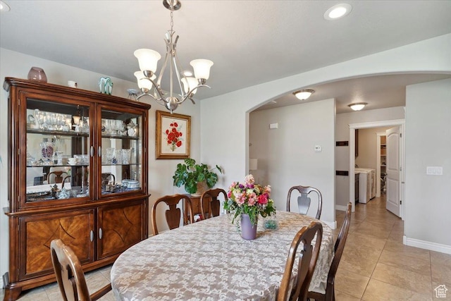 1776 W 3025 S, Syracuse, UT 84075 - dining space featuring arched walkways, light tile patterned floors, baseboards, a chandelier, and recessed lighting
