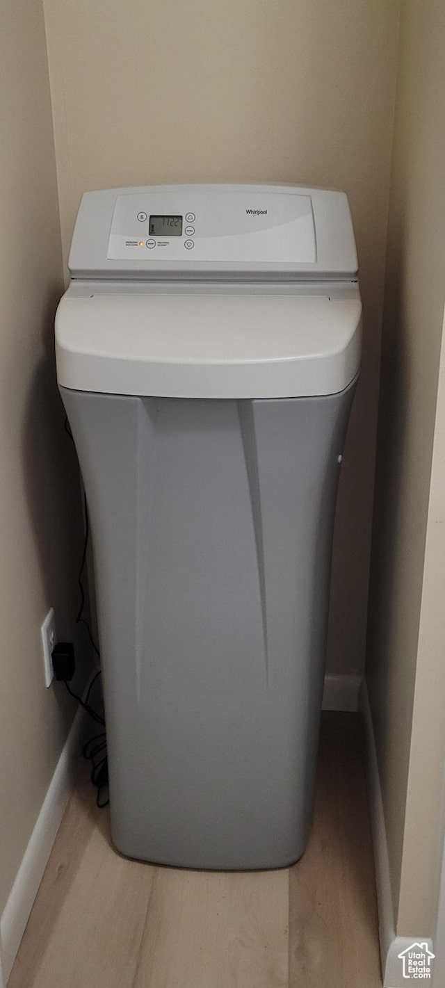 65 E 200 S, Orderville, UT 84758 - laundry view of a water softener, wood finished floors, and baseboards