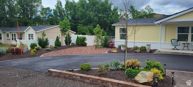 65 E 200 S, Orderville, UT 84758 - view of side of property with fence, brick siding, and driveway