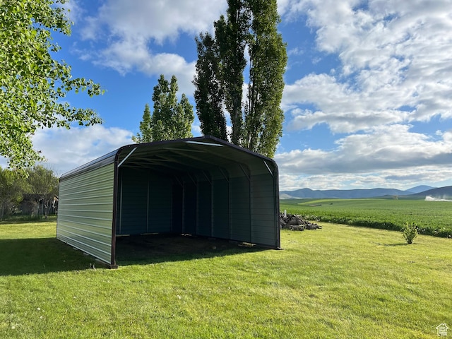 662 N 1600 E, Preston, ID 83263 - view of outdoor structure with a detached carport and a mountain view