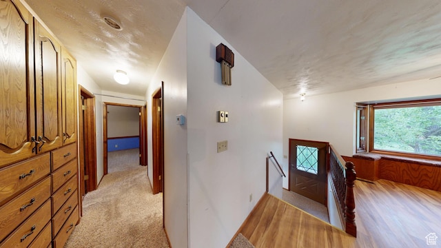 662 N 1600 E, Preston, ID 83263 - corridor featuring an upstairs landing and light colored carpet