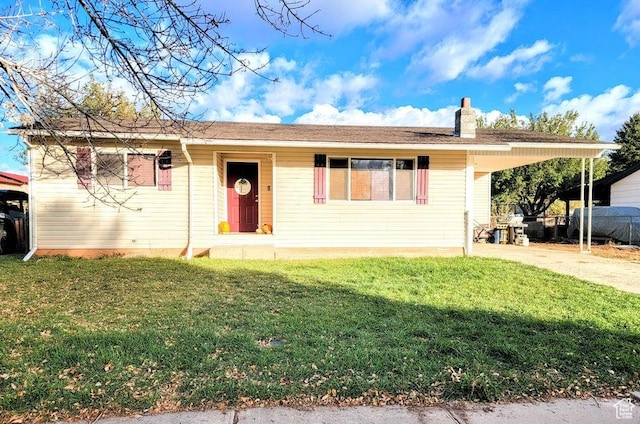 273 S 700 W, Parowan, UT 84761 - ranch-style home featuring a chimney, a front yard, a carport, and concrete driveway
