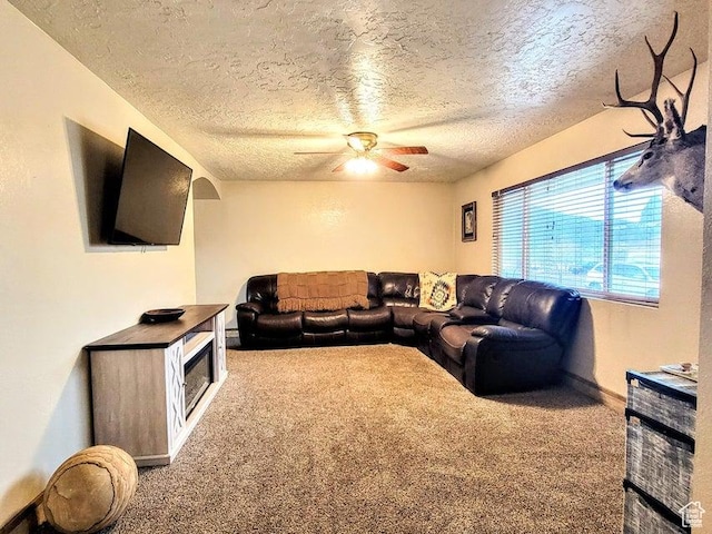 273 S 700 W, Parowan, UT 84761 - carpeted living area featuring a ceiling fan, a textured ceiling, and baseboards