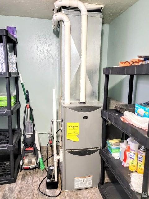 273 S 700 W, Parowan, UT 84761 - utility room featuring heating unit