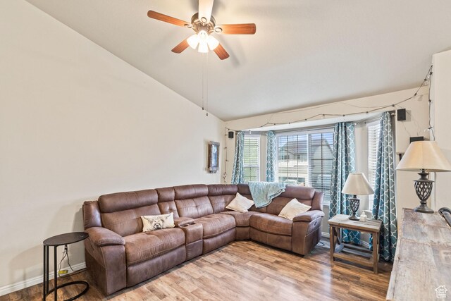 78 N Peach St E, Santaquin, UT 84655 - living room featuring vaulted ceiling, a ceiling fan, wood finished floors, and baseboards