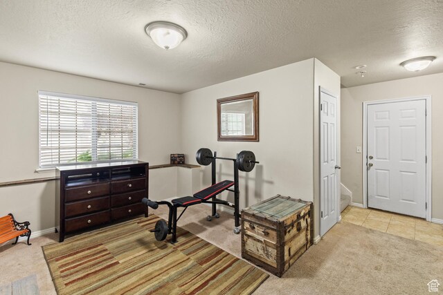78 N Peach St E, Santaquin, UT 84655 - exercise room featuring carpet floors, a textured ceiling, and baseboards