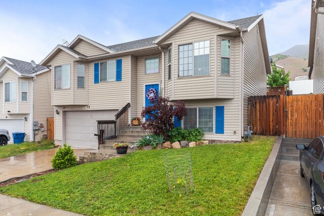 78 N Peach St E, Santaquin, UT 84655 - view of front of home featuring an attached garage and concrete driveway