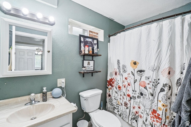 517 E Canyon View Dr N, Ogden, UT 84404 - bathroom featuring vanity, toilet, and curtained shower