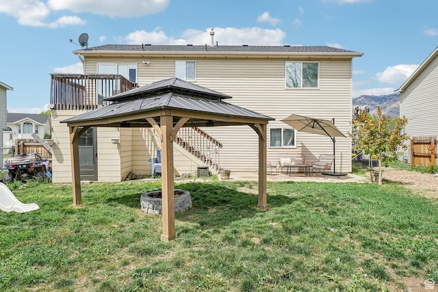 517 E Canyon View Dr N, Ogden, UT 84404 - rear view of house with a gazebo and a patio area