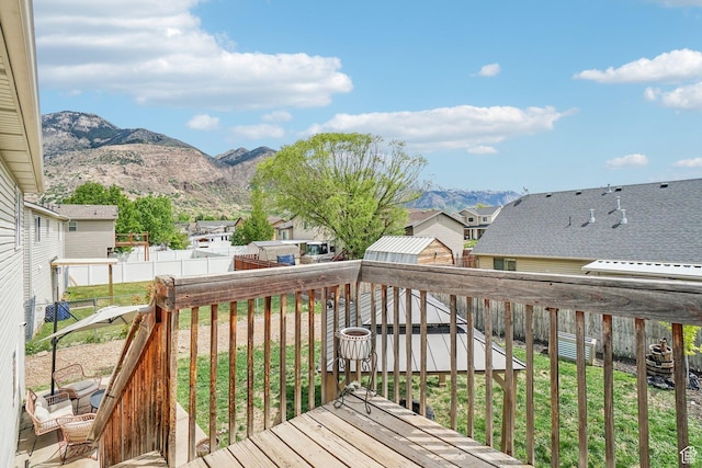 517 E Canyon View Dr N, Ogden, UT 84404 - deck with a mountain view and a residential view