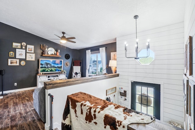 517 E Canyon View Dr N, Ogden, UT 84404 - kitchen with dark wood finished floors, a chandelier, a ceiling fan, a textured ceiling, and baseboards