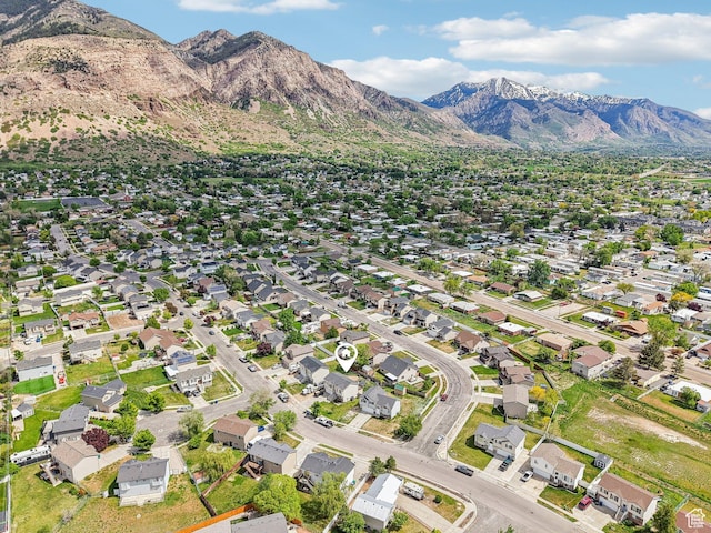 517 E Canyon View Dr N, Ogden, UT 84404 - aerial view of property and surrounding area with a mountainous background and nearby suburban area