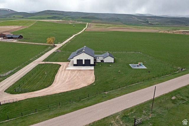 22 Old Ranch Rd, Montpelier, ID 83254 - aerial view of sparsely populated area featuring a mountain backdrop and agricultural land